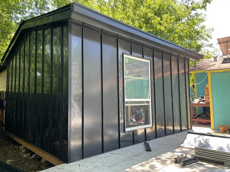 Black standing seam metal wall panels for Roof Inspection in Meridian